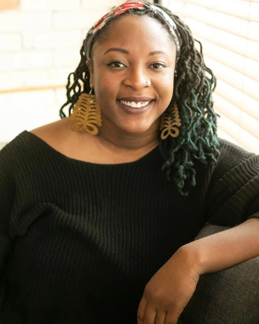 Kat Knox, Therapist at SEC LLC, smiling at the camera.