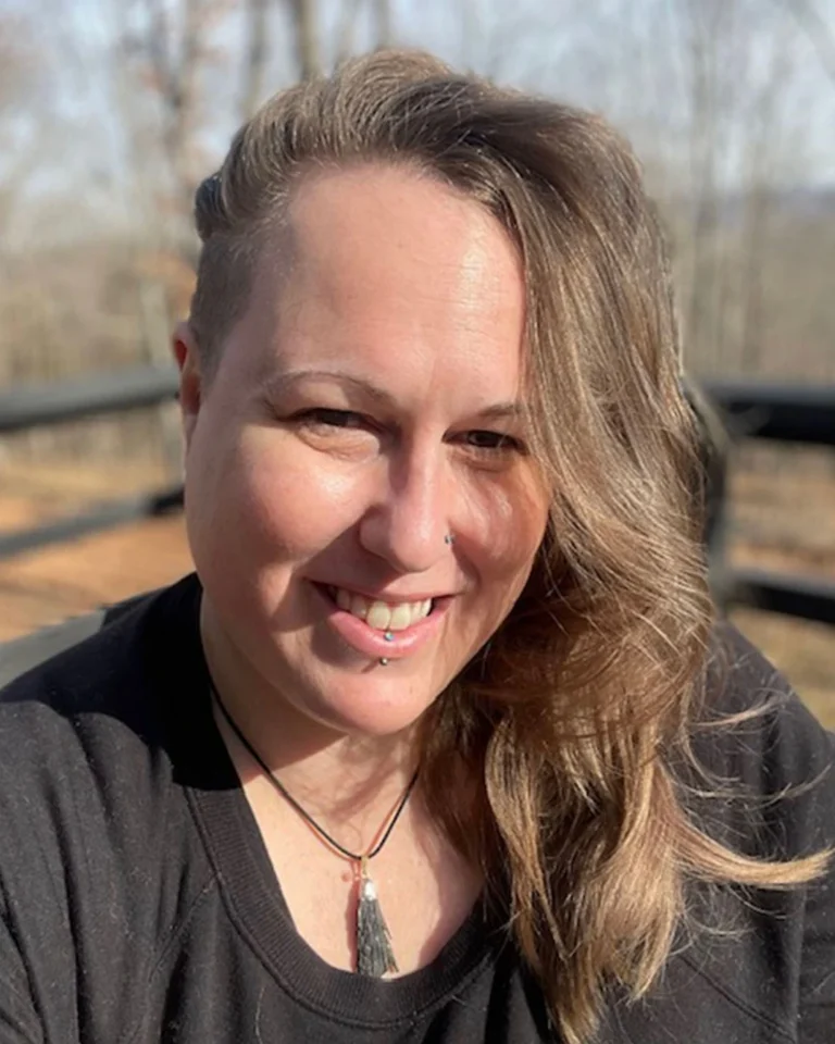 Lyza Ballard, Therapist at SEC LLC, smiling at the camera.